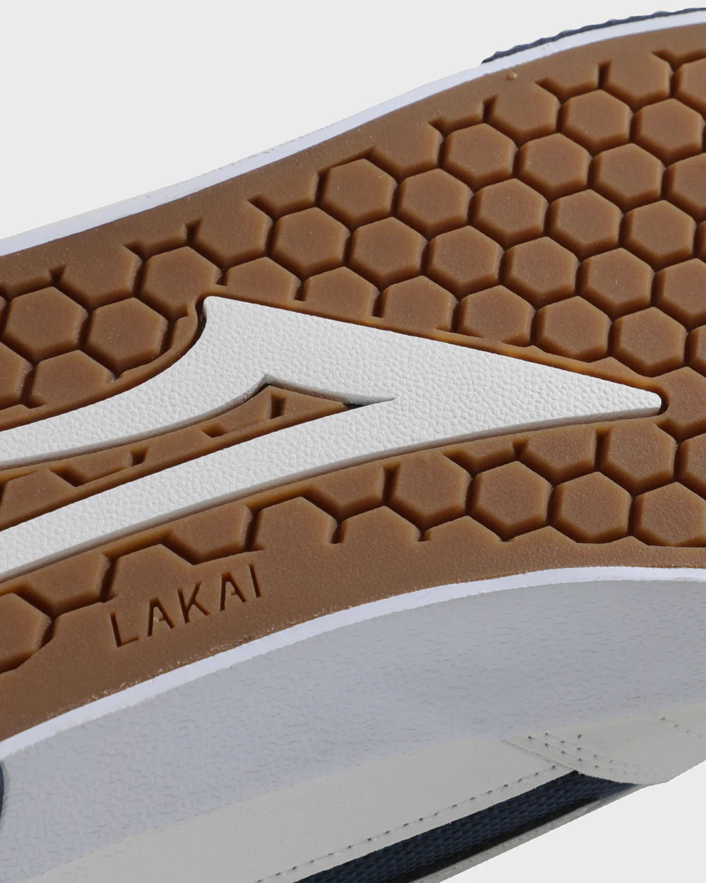 Lakai_Cambridge_White_Leather_Navy_Revlective_CLOSE_2.png
